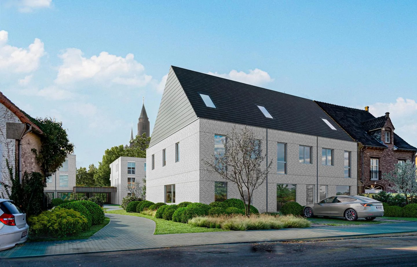 Impressie van de woningen van Morris met lichte gevels en een groene straat